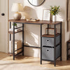 Side view of the small computer desk in rustic brown showcasing spacious tabletop and fabric drawers for organized storage.