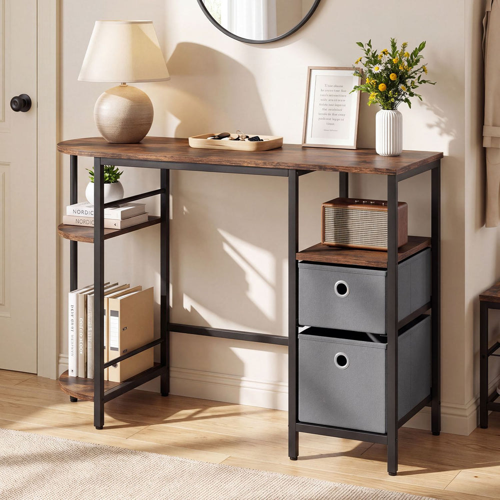 Side view of the small computer desk in rustic brown showcasing spacious tabletop and fabric drawers for organized storage.