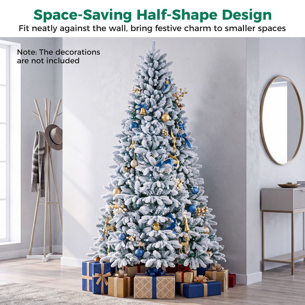 Snow-flocked half Christmas tree with warm white and multi-color LED lights, perfect for small spaces and festive decor.