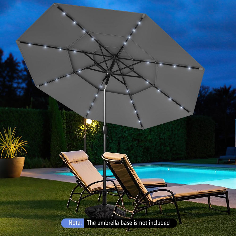 Gray 10 feet solar patio umbrella with 32 LED lights, 3-tier vented top, providing shade by the poolside.