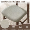 Padded seat of a solid rubber wood dining chair set, featuring breathable linen fabric for comfort and durability.