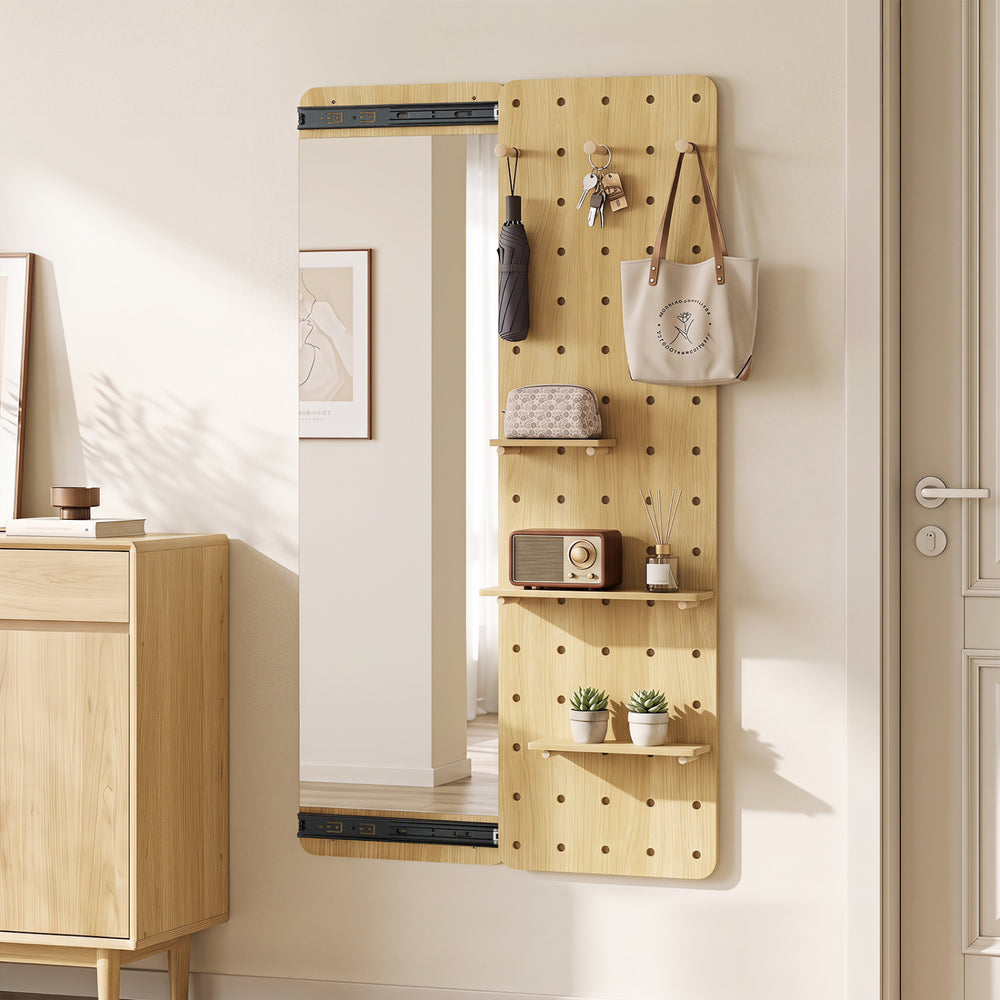 Solid wood full-length mirror with sliding pegboard, shelves, and hooks for versatile entryway storage and style.