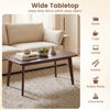 Solid wood modern coffee table with tapered legs in walnut finish, featuring a wide tabletop for easy access to daily.