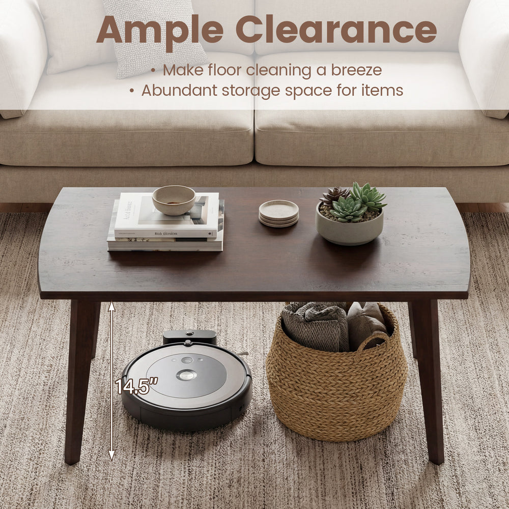 Solid wood modern coffee table with tapered legs in walnut, featuring 14.5" clearance for easy floor cleaning.