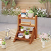 Solid wood plant stand with four tiers, featuring a waterproof finish, perfect for displaying potted plants on.