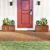 Solid wood raised garden bed with slat design, ideal for flowers and vegetables, placed at a front door entrance.