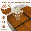 Square coffee table with solid wood veneered top in warm walnut finish, featuring a floating quad-section design for.
