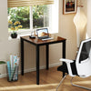 Square dining table with solid rubber wood frame, placed by a window, ideal for dining and activities in any room.