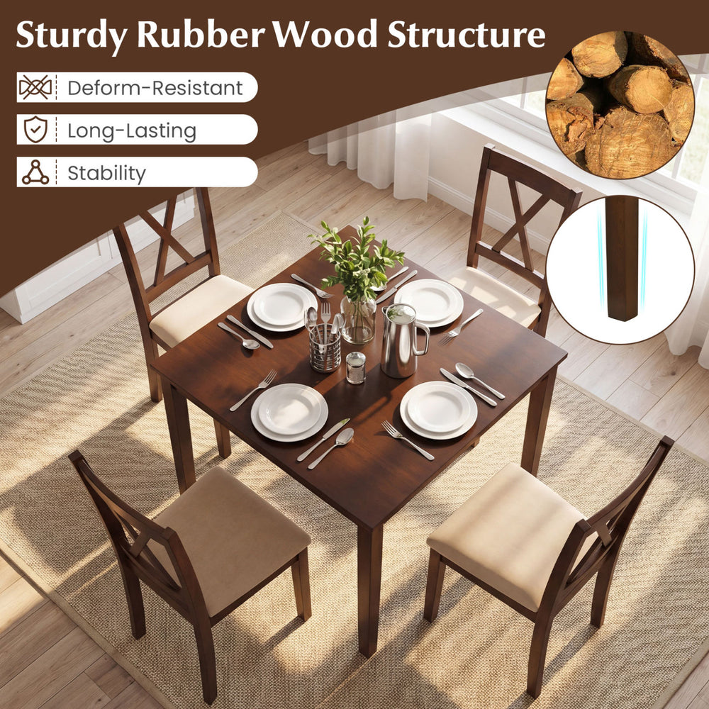 Square walnut kitchen table with four armless chairs, featuring a sturdy rubber wood structure for stability.