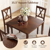 Square walnut kitchen table with four armless chairs, easy to clean, seats up to 4 people, 165 lbs weight capacity.