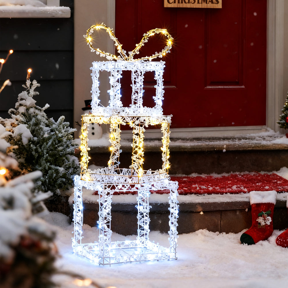 Stacked lighted gift boxes set of 3 with 200 LED lights, perfect for outdoor holiday decoration.
