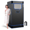 Portable steam sauna in black with remote control, featuring a 3L steam generator and foldable chair for home use.