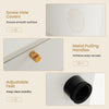 Close-up of metal pulling handles and screw hole covers on a white storage cabinet for easy access and smooth surface.