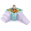 Soft play set with ball pit, ramp, and staircase in purple, promoting imaginative play and motor skills for toddlers.