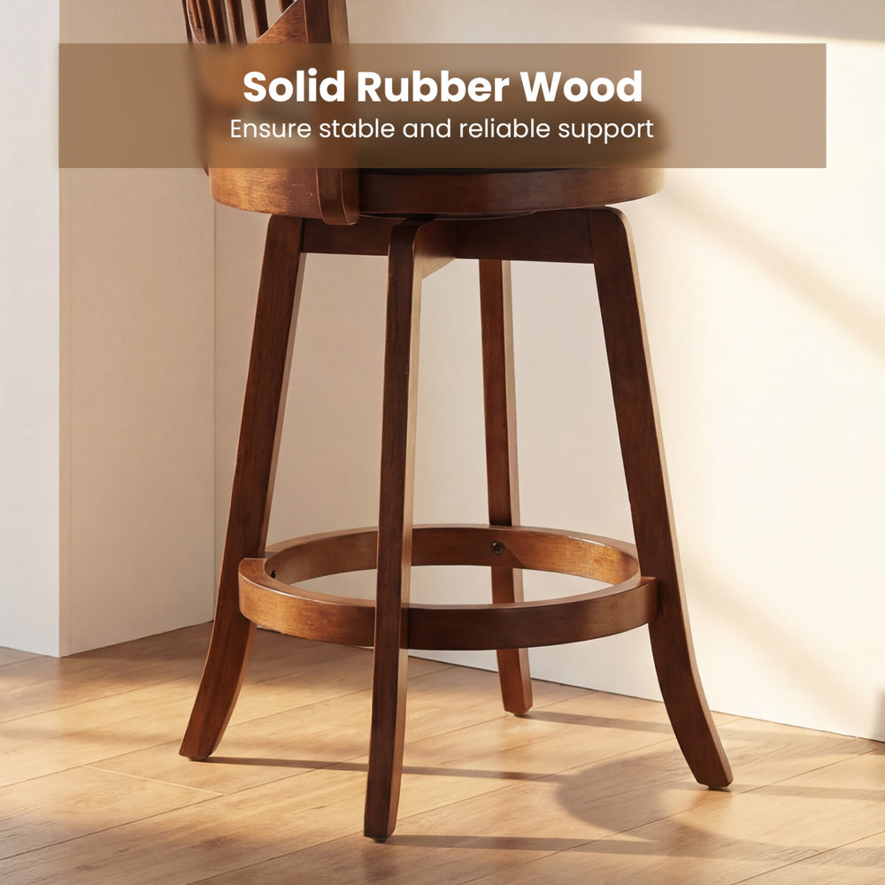 Swivel bar stool with solid rubber wood frame and curved backrest, perfect for kitchen islands and dining rooms.