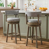 Set of 2 swivel bar stools with linen fabric upholstery and rubberwood frame, ideal for kitchen islands or home bars.