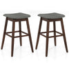 Set of 2 swivel bar stools with brown rubber wood legs and gray linen fabric, perfect for kitchens and dining rooms.