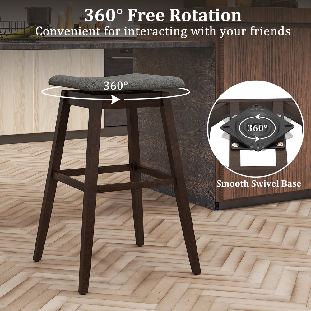 Brown swivel bar stool with rubber wood legs and footrest, featuring a 360° rotating seat for comfortable interaction.