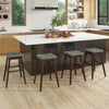 Set of two swivel bar stools with brown rubber wood legs and gray linen fabric, perfect for kitchens and dining rooms.