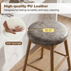 Backless swivel barstool with soft PU leather seat and solid wood legs, designed for kitchen islands and home bars.