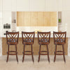 Four 360° swivel counter height chairs with PU leather cushioned seats, showcasing a sturdy rubber wood design for.