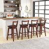 Swivel upholstered PU leather stool with backrest, cushioned seat, and footrest, ideal for kitchen or dining room use.