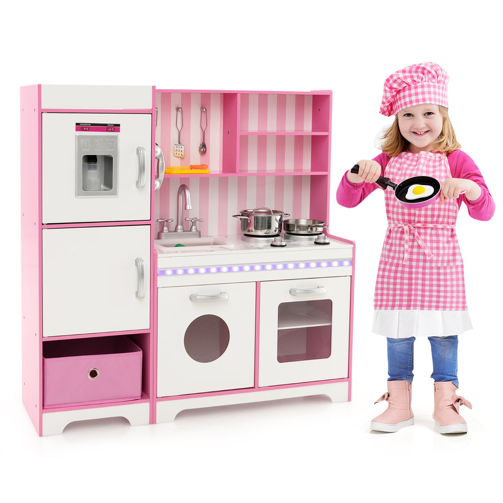Kids kitchen playset in pink with LED lights, removable sink, and cooking accessories for imaginative play.
