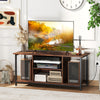 Rustic brown TV stand with open storage shelves, accommodating TVs up to 50 inches, featuring built-in power outlets.