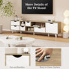 Close-up of the oak TV stand's cut-out handles and easy-to-clean surface, designed for TVs up to 65” for modern storage.