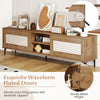 TV stand with waveform fluted doors in oak, featuring open shelves and concealed storage for TVs up to 70 inches.