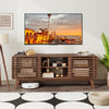 Walnut TV stand for TVs up to 65", featuring sliding doors and adjustable shelves, perfect for living room storage.