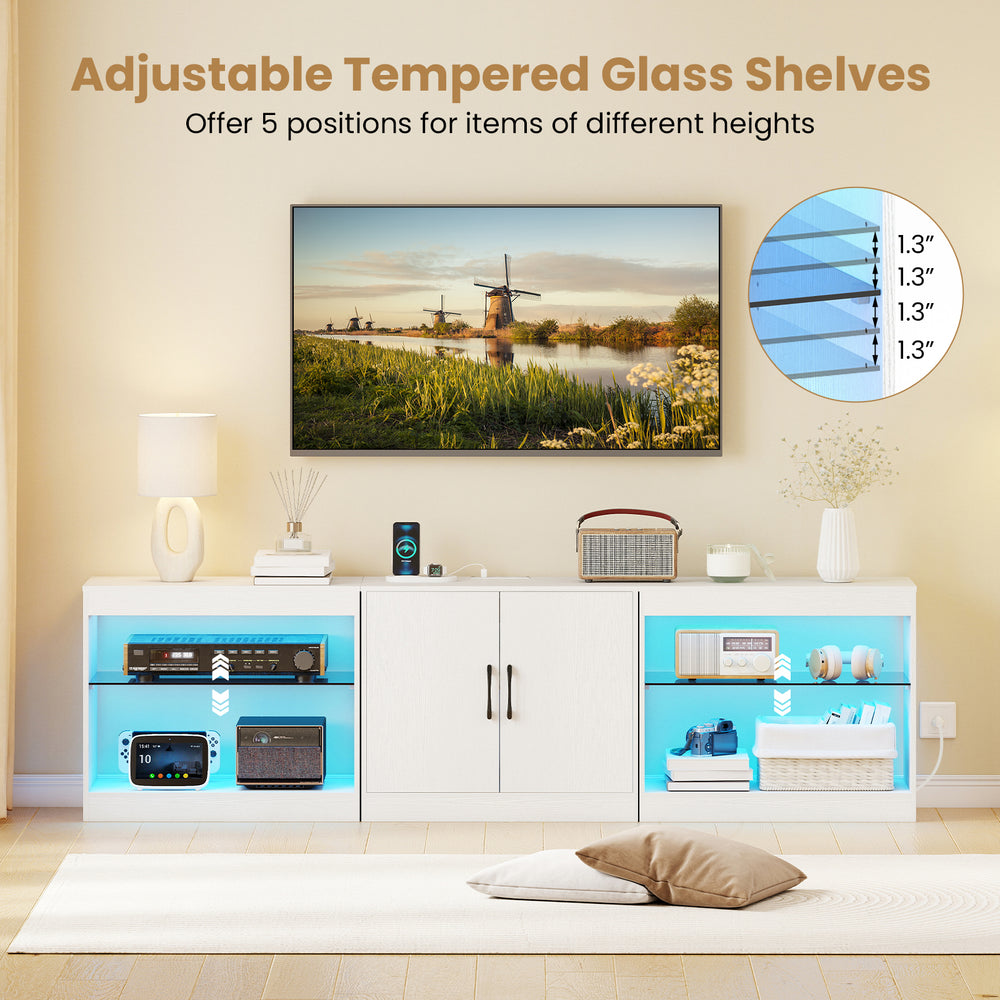 Adjustable tempered glass shelves on a white TV stand with RGB LED lighting, designed for TVs up to 85 inches.