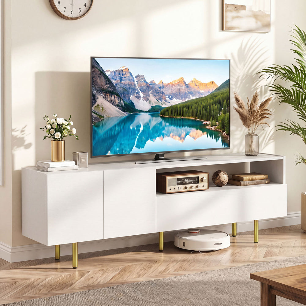 White TV stand for TVs up to 70" featuring storage cabinet, open shelf, and raised metal legs for living room use.