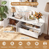 White TV stand for TVs up to 70" featuring a spacious tabletop, storage cabinet, large drawer, and raised metal legs.