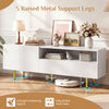 TV stand with raised metal legs, open shelf, and storage cabinet, suitable for TVs up to 70" in living room or bedroom.