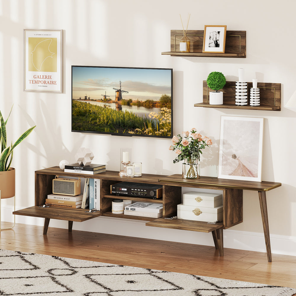 Mid-century modern TV stand in walnut featuring two flip-over cabinets, providing ample storage and a stylish display.