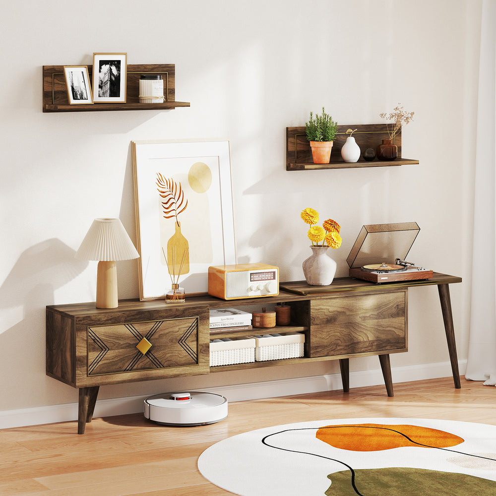 Mid-century modern TV stand in walnut with open compartments and wall-mounted shelves, perfect for TVs up to 85 inches.