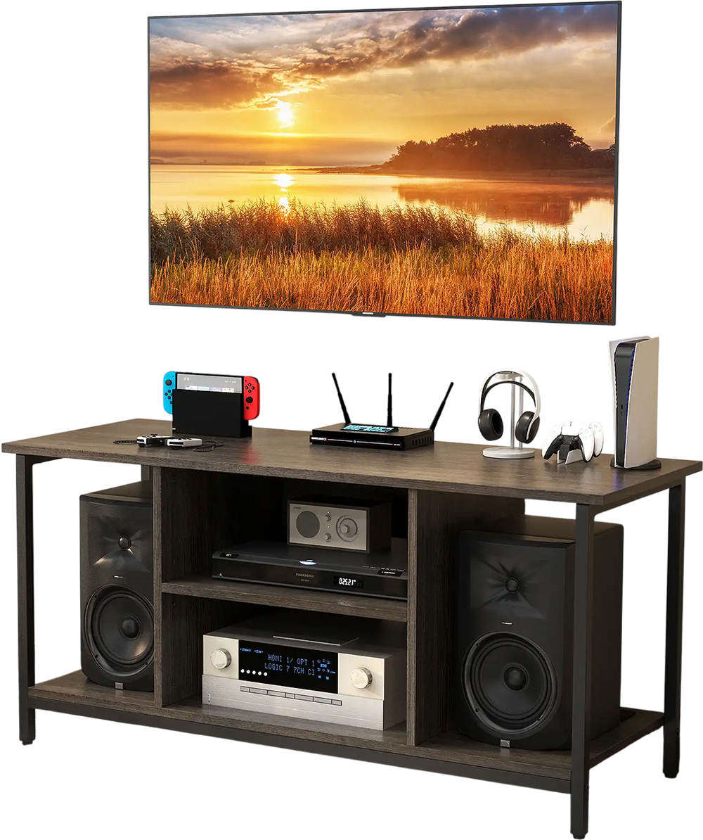 3-Tier gray TV stand with adjustable shelf, power outlet, and open storage for media supplies and audio speakers.