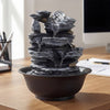 Tabletop water fountain with multiple tiers, rolling crystal ball, and color-changing LED light for tranquil desk.