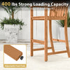 Tall Adirondack chair in natural acacia wood with armrests, footrest, and 400 lbs capacity, ideal for patio relaxation.