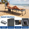Gray tanning chair with face and arm holes, adjustable backrest, and storage pockets for beach or patio use.