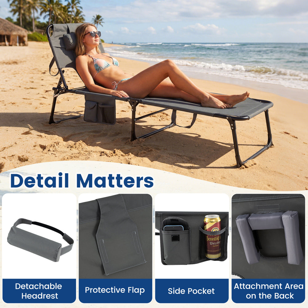 Gray tanning chair with face and arm holes, adjustable backrest, and storage pockets for beach or patio use.