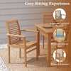 Single teak wood dining chair with inclined backrest and slatted seat, shown in a front-side view for the backyard.