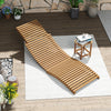 Teak wood folding chaise lounge chair with slatted seat, perfect for backyard or poolside relaxation.