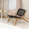 Teak wooden chair showcasing a handwoven cordage backrest, ideal for stylish indoor or outdoor relaxation.