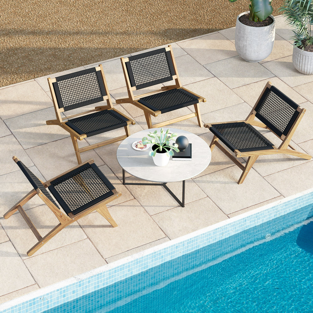 Teak wooden chairs with handwoven cordage seats arranged around a coffee table, perfect for indoor or outdoor use.