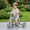 Toddler convertible trike in green with a carbon steel frame, designed for stability and safety, perfect for outdoor.