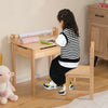 Toddler activity table and chair set in natural wood, featuring a paper roll holder and high backrest for support.