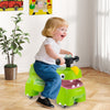 Toddler ride-on toy car in green with dinosaur design, featuring lights, sounds, and under-seat storage for fun play.