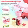 Toddler tricycle in pink with anti-slip handlebars, limited steering angle, and front basket for toy storage.